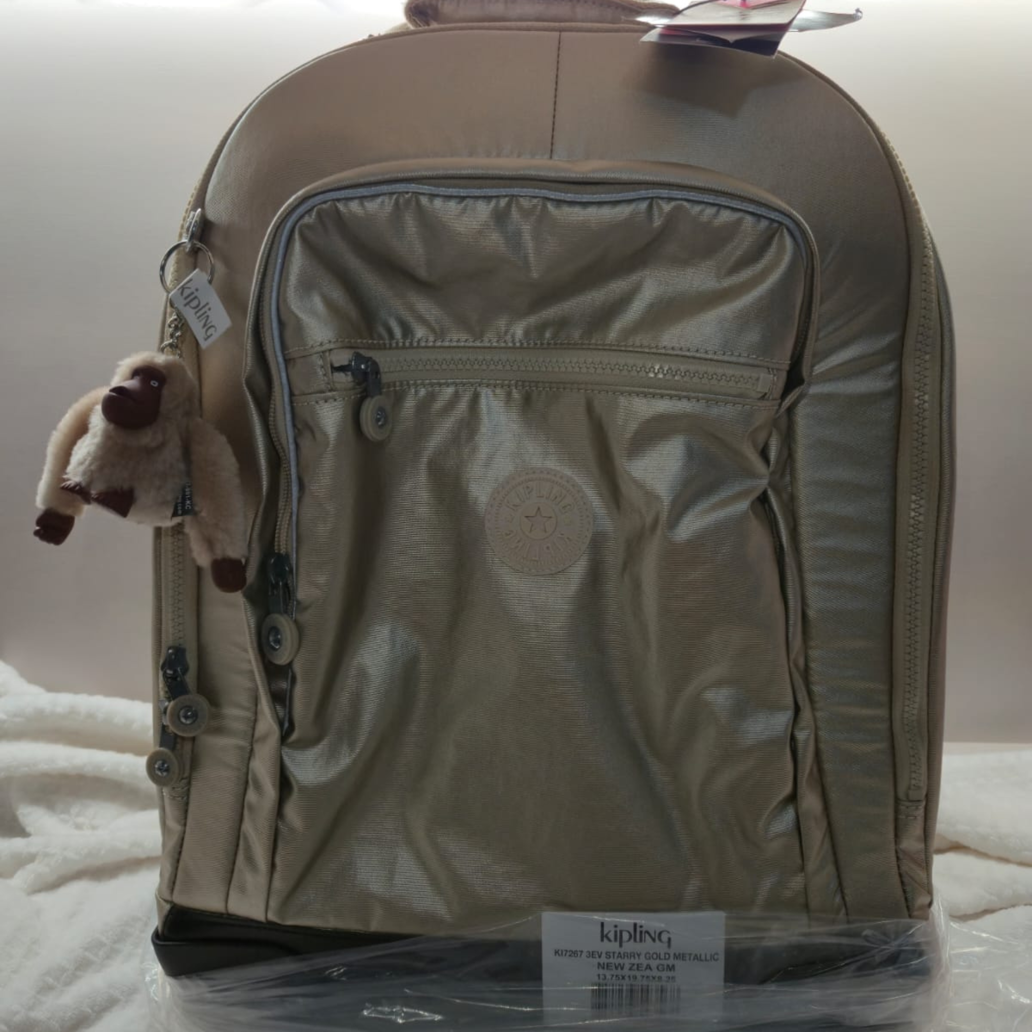 MOCHILA DE RUEDAS KIPLING NEW ZEA (DORADA)